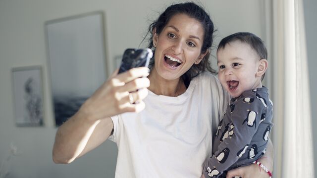 Mother taking selfie with toddler son SMALL